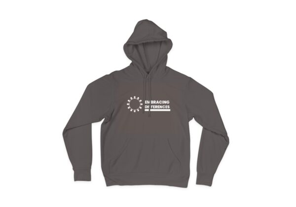 Front view of a brown hoodie showcasing an inspiring design on the chest. The design consists of interlocking puzzle pieces in vibrant colors, symbolizing the unity and acceptance of differences. The hoodie is made from cozy, durable fabric and features a comfortable, loose fit. When you buy this hoodie, you actively contribute to promoting autism awareness and fostering a more inclusive society.